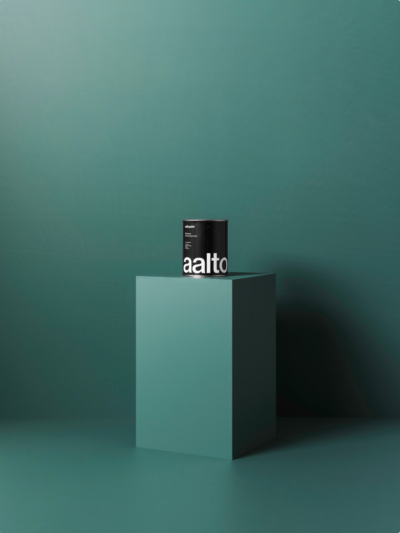 Aalto paint tin sitting on a plinth with a green painted backdrop